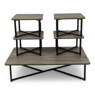 A wooden floor table set consisting of four chairs and a large table