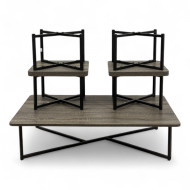 A wooden floor table set consisting of four chairs and a large table