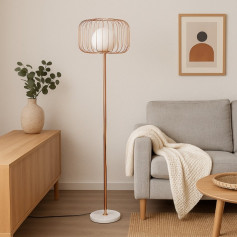 Elegant gold design stand lamp with a modern circular base