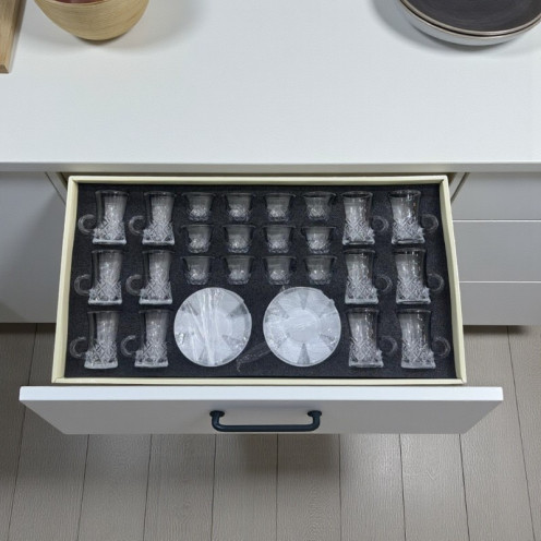 36-piece glass cups and saucers set in various shapes. 36-piece glass cups and saucers set in various shapes.