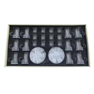 36-piece glass cups and saucers set in various shapes.