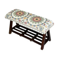 A beautifully designed bench with elegant, embroidered details, a touch that combines sophistication and simplicity. Natural Indian style.