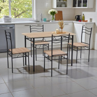 Dining table with four elegant light-colored wooden chairs