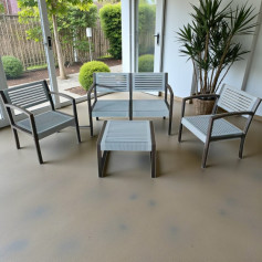 Outdoor seating set in gray consisting of 3 chairs and a modern table