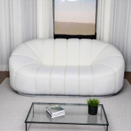 A comfortable boucle sofa with a luxurious white wave design.