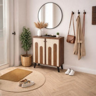 A stylish and unique two-door shoe cabinet/shoe rack.