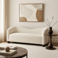 A luxurious and distinctive 3-seater sofa with modern wooden legs.