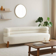 A luxurious and modern multi-seater sofa with contemporary wooden legs.