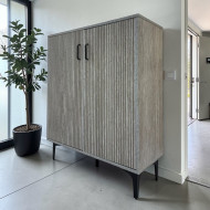 Elegant and sophisticated two-door shoe cabinet with a multi-colored stripe design.