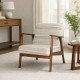 A modern, stylish wooden single chair available in several colors, featuring soft, comfortable fabric and providing a relaxing seating experience.