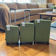 Large, medium, and small travel bag sets for family trips in various colors