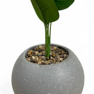 A small artificial tree with wide leaves resembling a banana tree, 45 cm high.