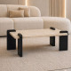 A single wooden table with luxurious bases, featuring a distinctive design and available in several colors.