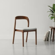 A single fabric chair for a luxurious and elegant dining table in several colors.