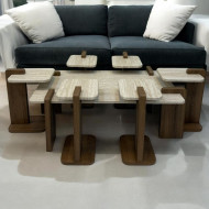 A luxurious and distinctive 6-piece floor table set in a wood finish.