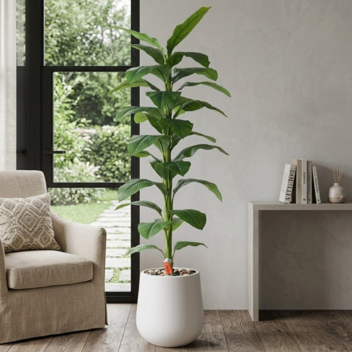 Artificial tropical plant with large leaves and a 210cm tall plastic pot.