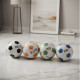 A sports football designed in bright and clear colors.