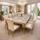 A luxurious, elegant gold marble dining table that seats 12.