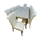 A luxurious, elegant gold marble dining table that seats 12.