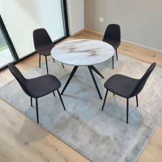 طاولة طعام دائرية باللون البيج 4 كراسي بتصميم بقواعد مميزة سوداء 