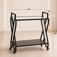 A uniquely designed serving trolley with a luxurious gray iron base.