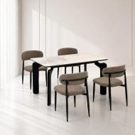 A luxurious dining table with four chairs and a unique ceramic top design.