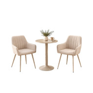 A modern relaxation set consisting of a round table and two elegant chairs.