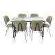 A luxurious beige dining table for six, featuring a stunning, high-gloss ceramic surface built to withstand daily use with ease.