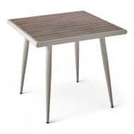 A café table with an elegant square design in dark brown.