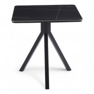 A ceramic café table with a luxurious and attractive design, featuring an elegant black surface with marble patterns.
